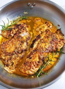 Red Snapper Fillets in a pan.