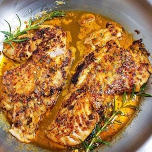 Red Snapper Fillets in a pan.