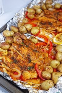 Vegetables and Baked Fish on foil.