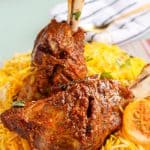 Two lamb shanks with saffron rice.