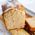 Partially-sliced loaf of Yogurt Cake.