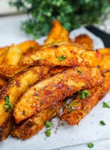 Pile of Crispy Baked Potato Wedges.