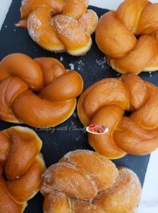 Twisted Donuts on a black surface.