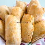 Several African Fish Pies on a cloth napkin.