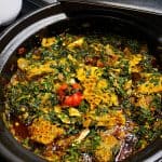 Spinach Stew (Efo riro) in a black pot.