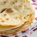 Homemade Shawarma Bread (Flour Tortillas) on a cloth napkin.