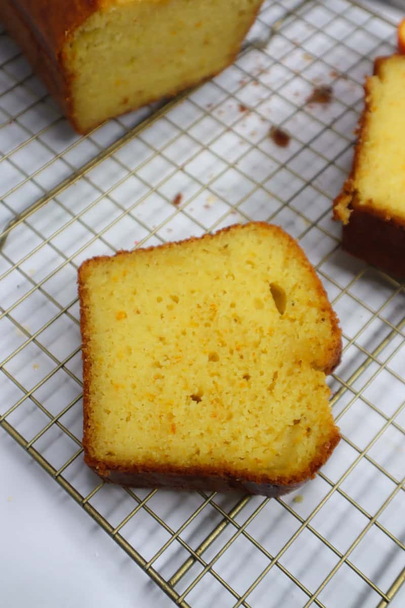 Slice of orange cake on a rack