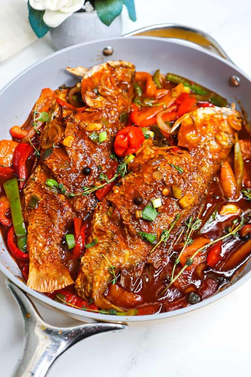 Pan of Jamaican brown stew fish.