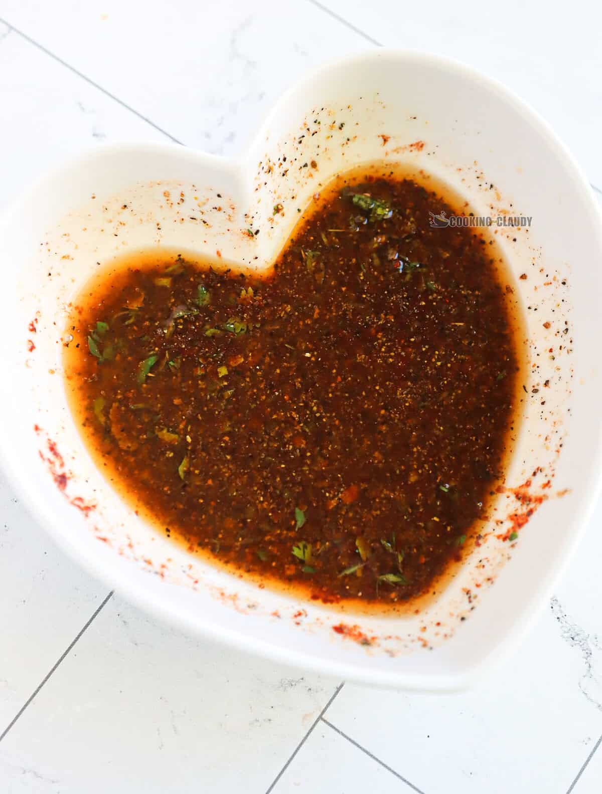 Marinade in a heart-shaped bowl.