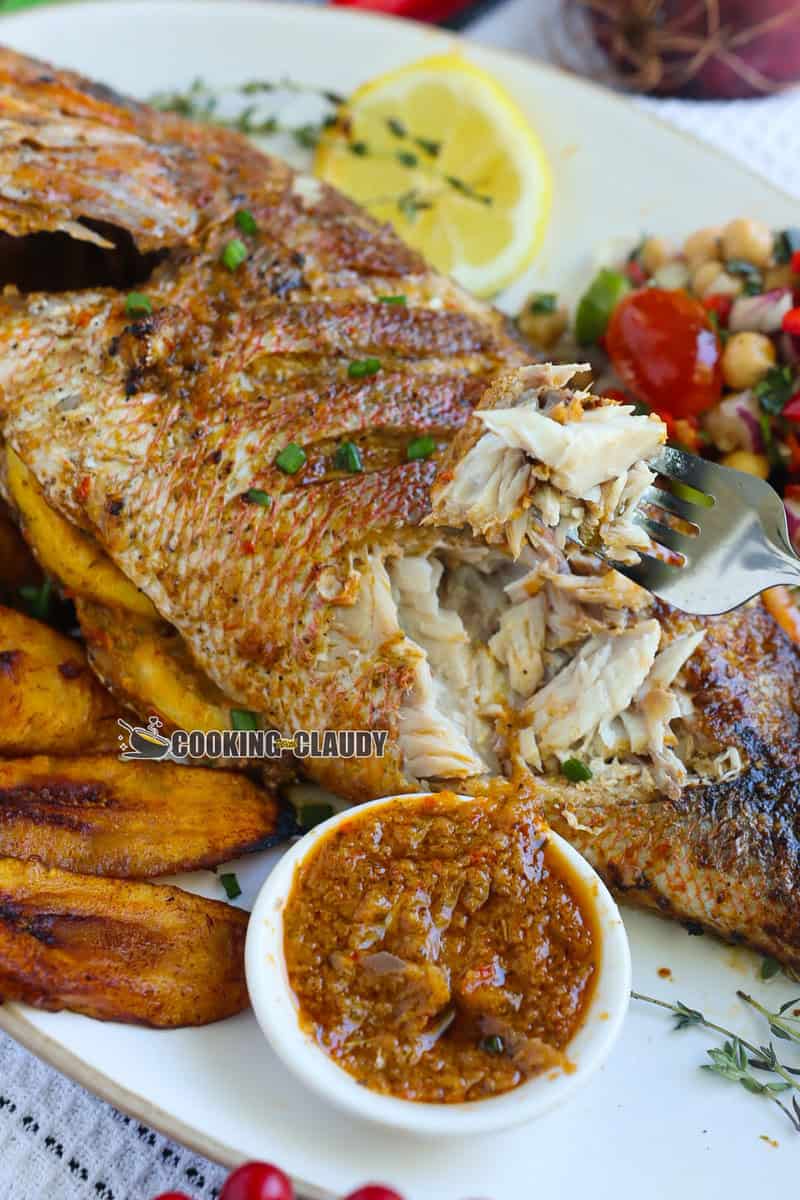 Fork grabbing some Caribbean Grilled Red Snapper.