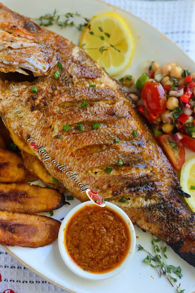 Caribbean Grilled Red Snapper set on a large plate.