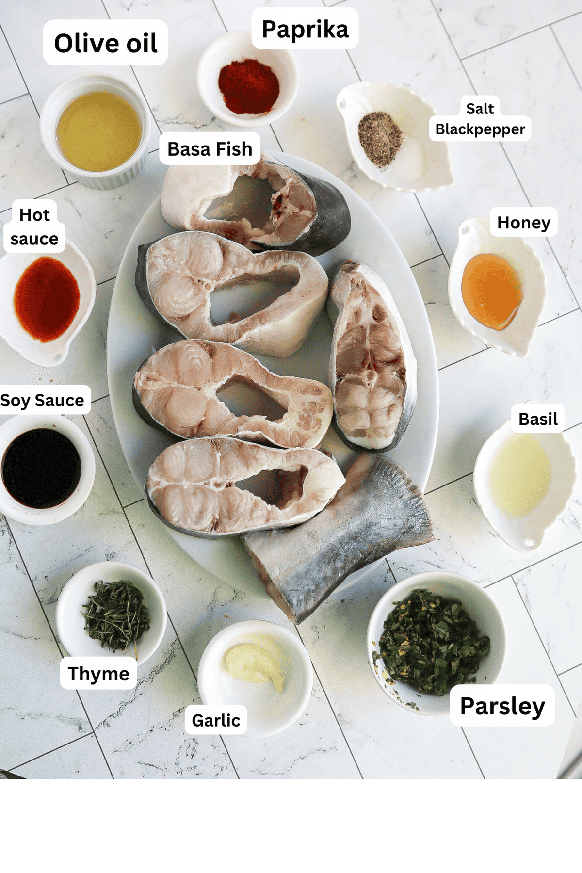 Baked Basa Fish ingredients including soy sauce, hot sauce, and parsley.