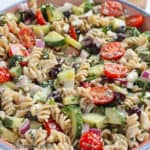 Bowl of colorful Mediterranean Pasta Salad.