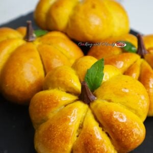 Pumpkin-Shaped Dinner Rolls in a plate.