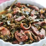White dish filled with Southern Collard Greens.