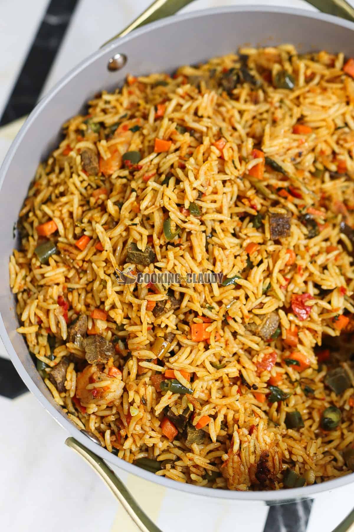 Rice in a pot with 2 handles.