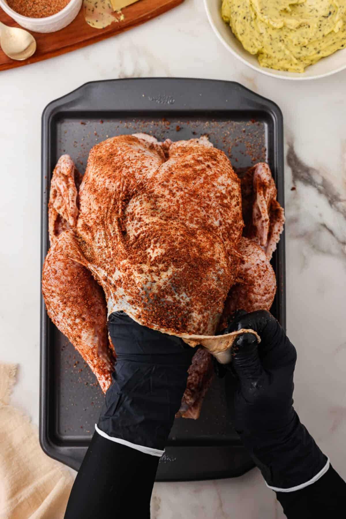 seasoning the whole turkey with a dry rub. 