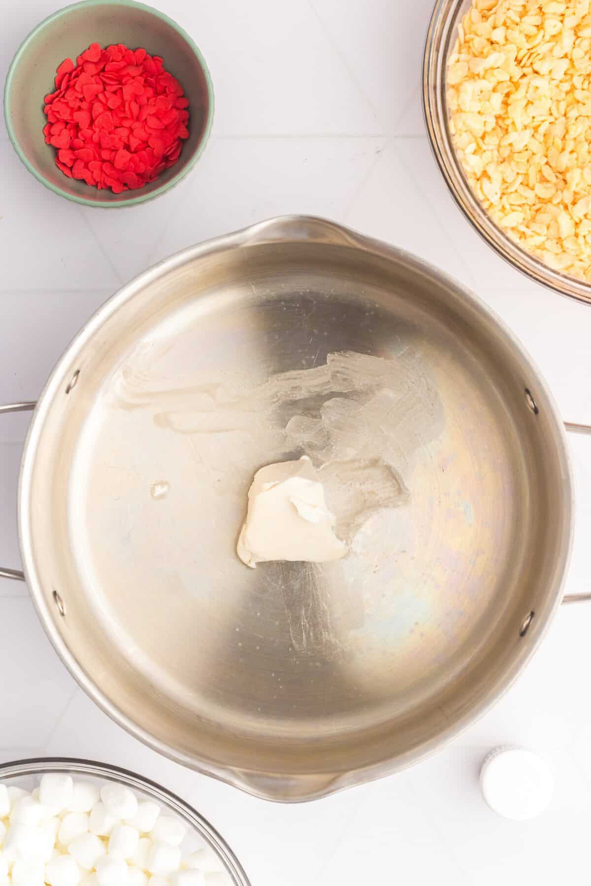 Butter melted in a large pot. 