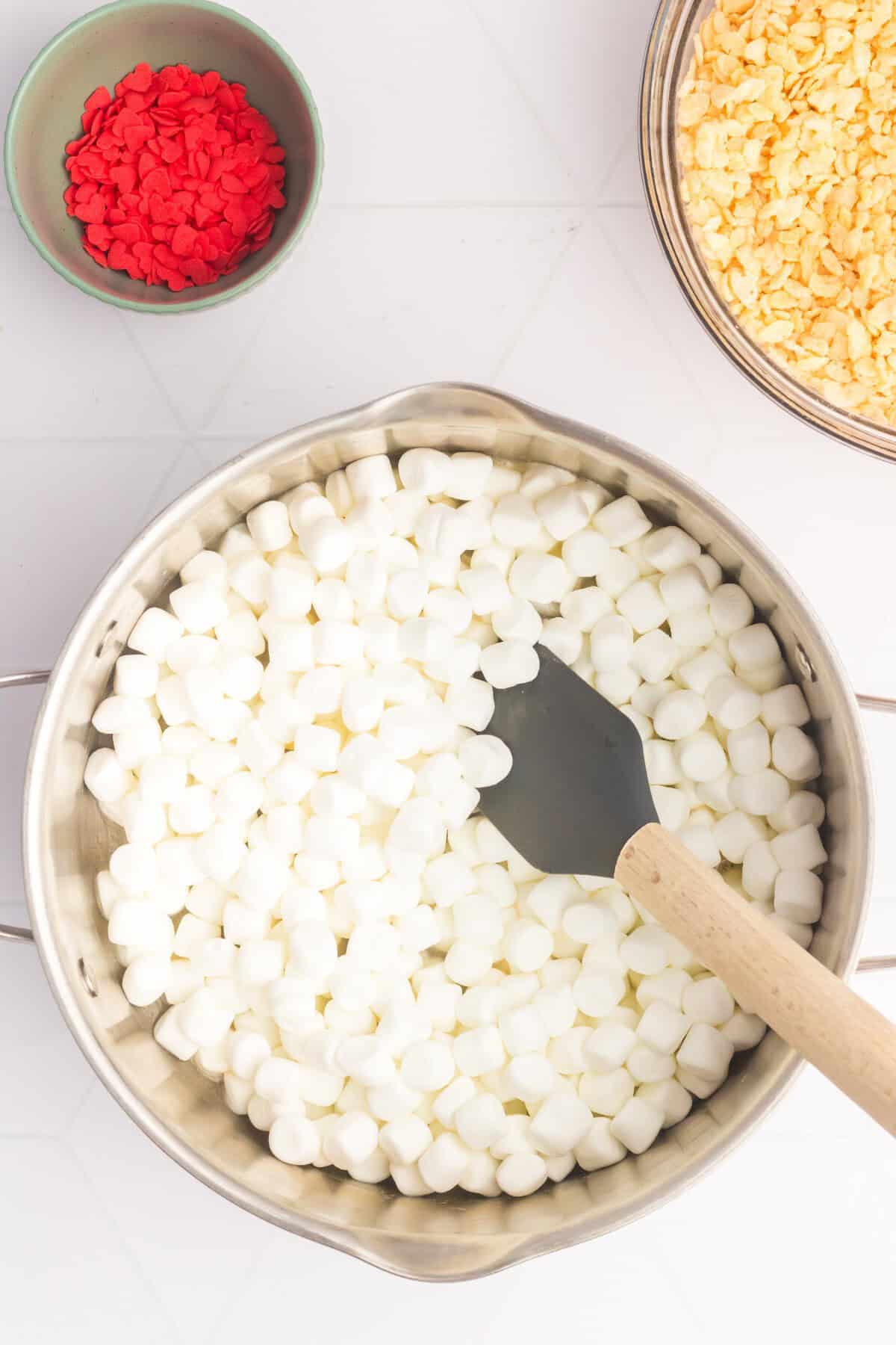 Mini marshmallows in a large pot. 