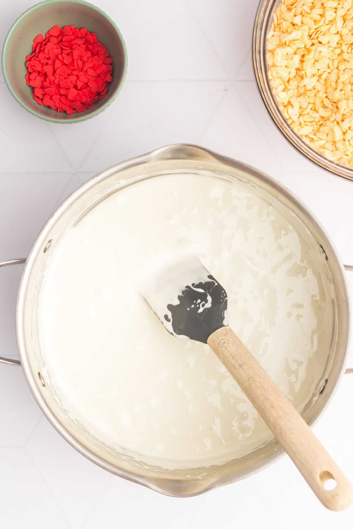 Melted mini marshmallows in a large pot. 