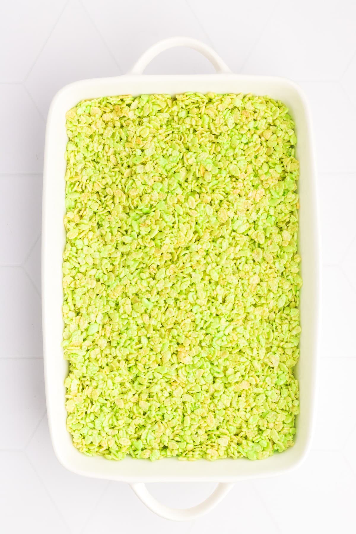 Rice Krispie Christmas treats in a baking dish. 