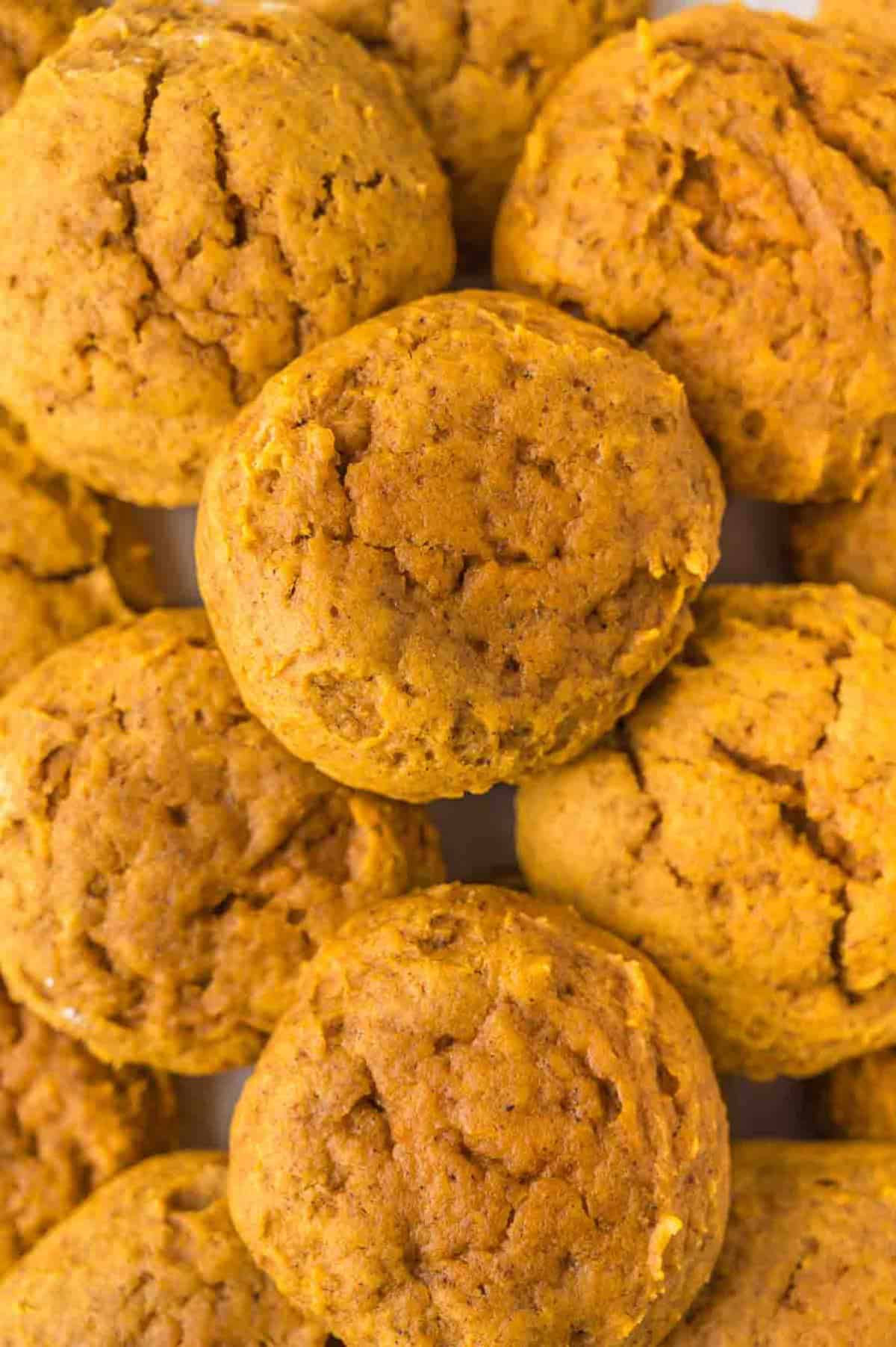 moist and chewy pumpkin spice cookies served in a plate.