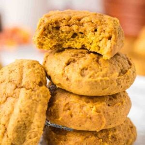 moist and chewy pumpkin spice cookies served in a plate.