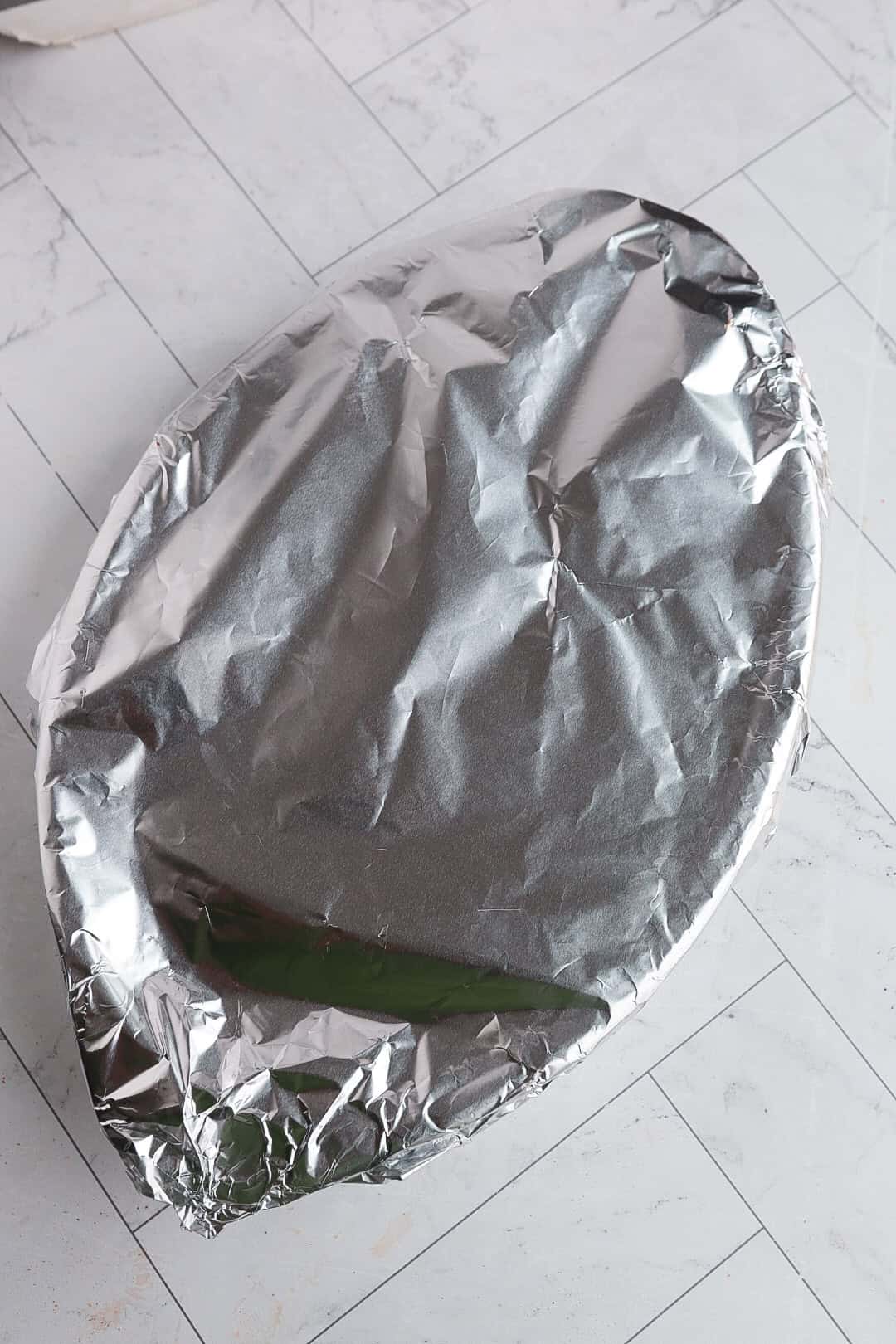 a baking dish covered with foil. 