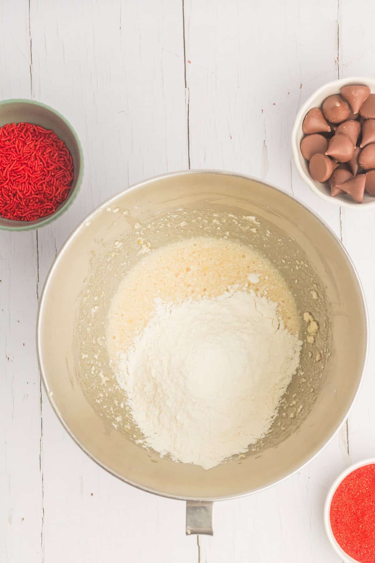 Combining the wet and dry ingredients for the cookies. 