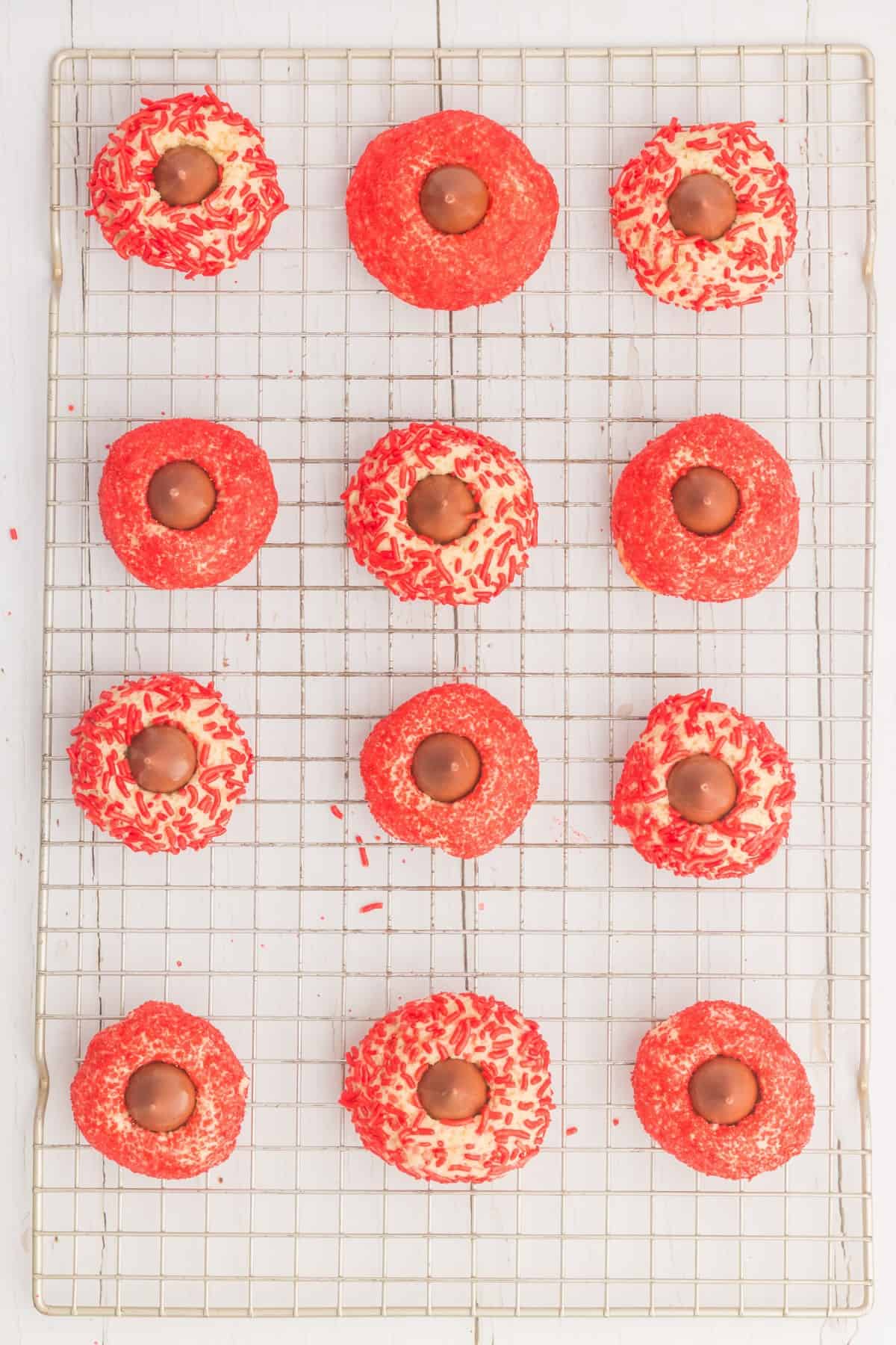 Baked Christmas cookies on a wire rack. 