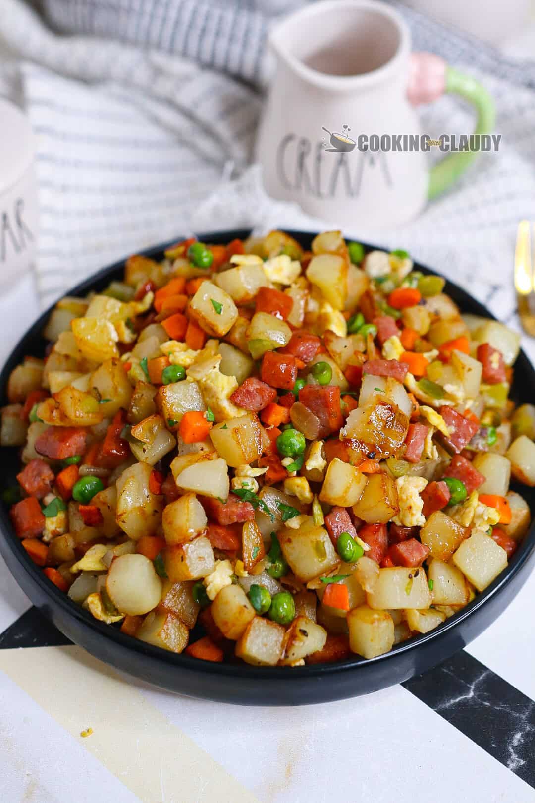 potatoes breakfast in a black plate