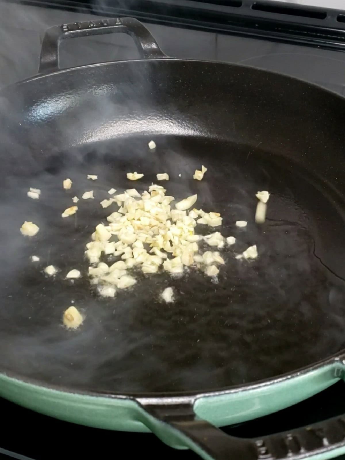 sauteed garlic in a pan