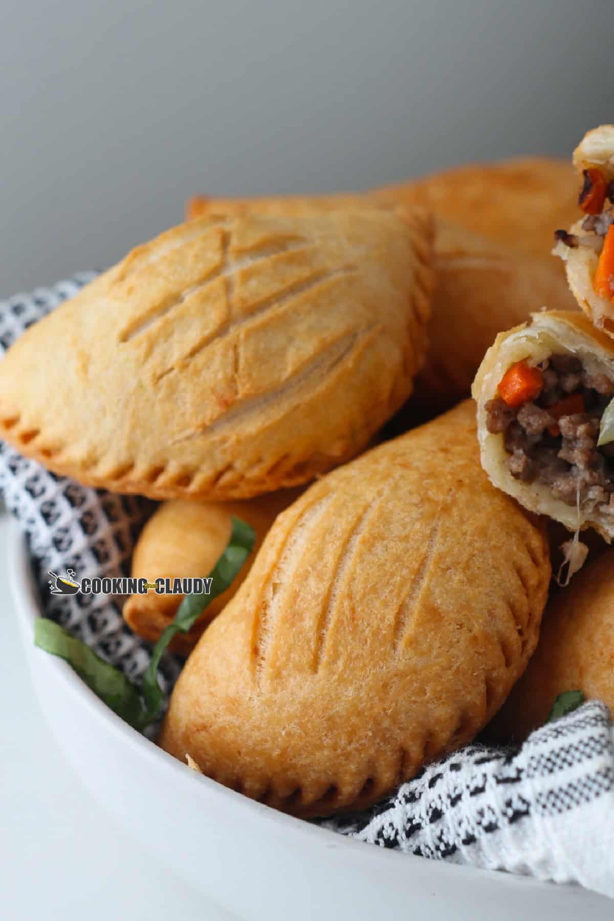 A plate of nigerian meat pie pastries.