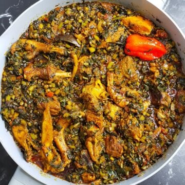 potato leaves stew in a pot