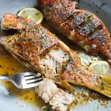 pan seared red snapper in a pan