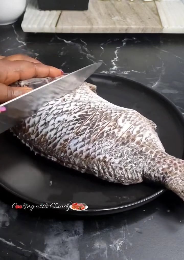 slitting whole tilapia before baking
