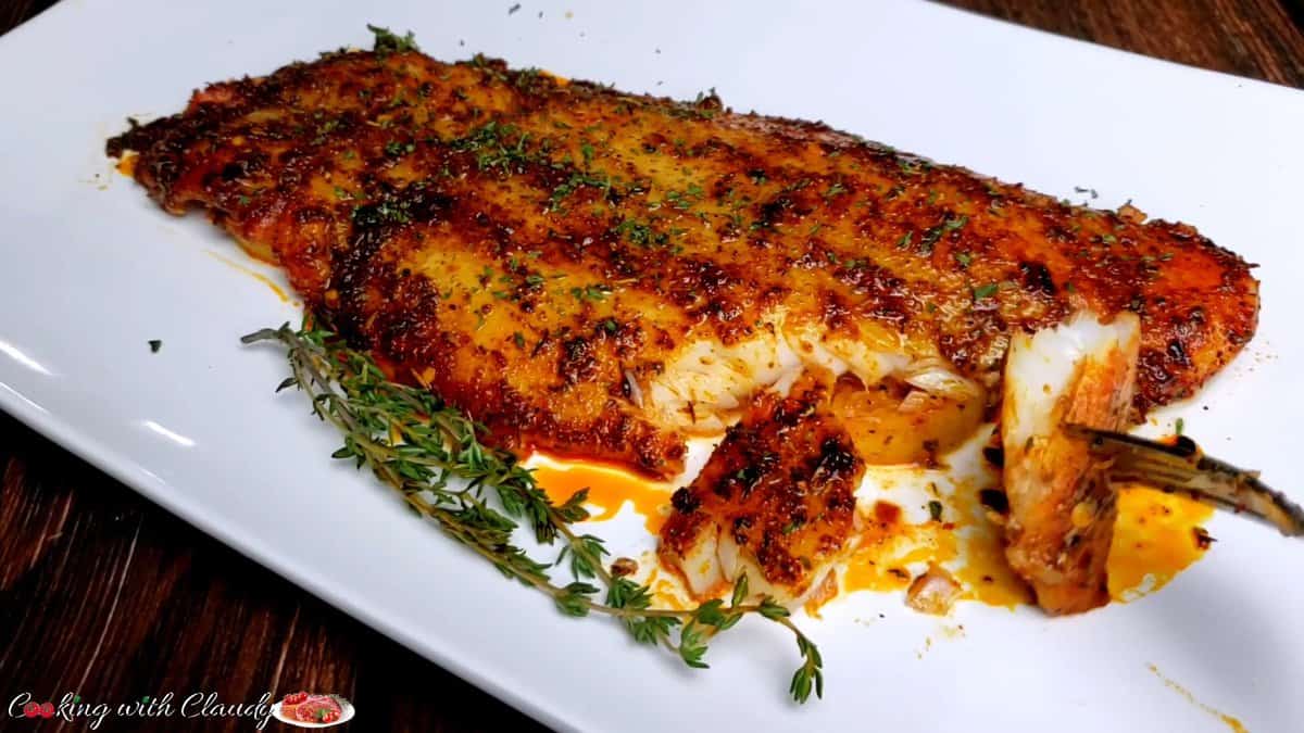 Super Easy Oven Baked Fish-Fillet in a white plate
