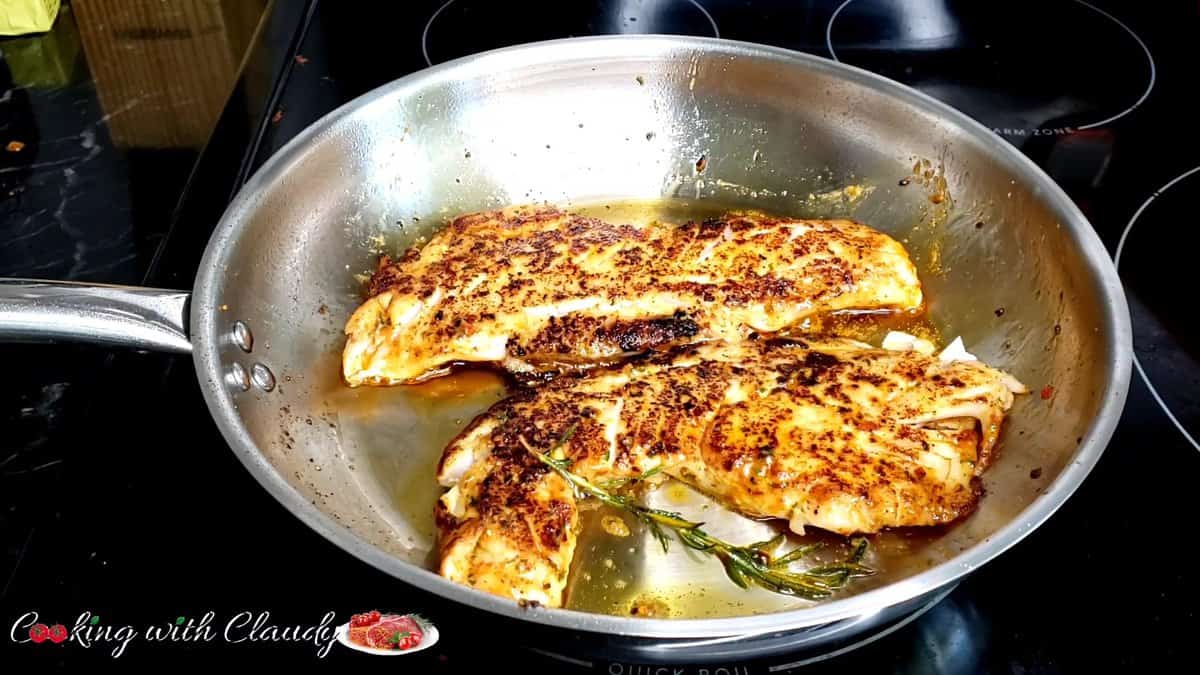 crispy pan seared red snapper fillets in cast iron skillet
