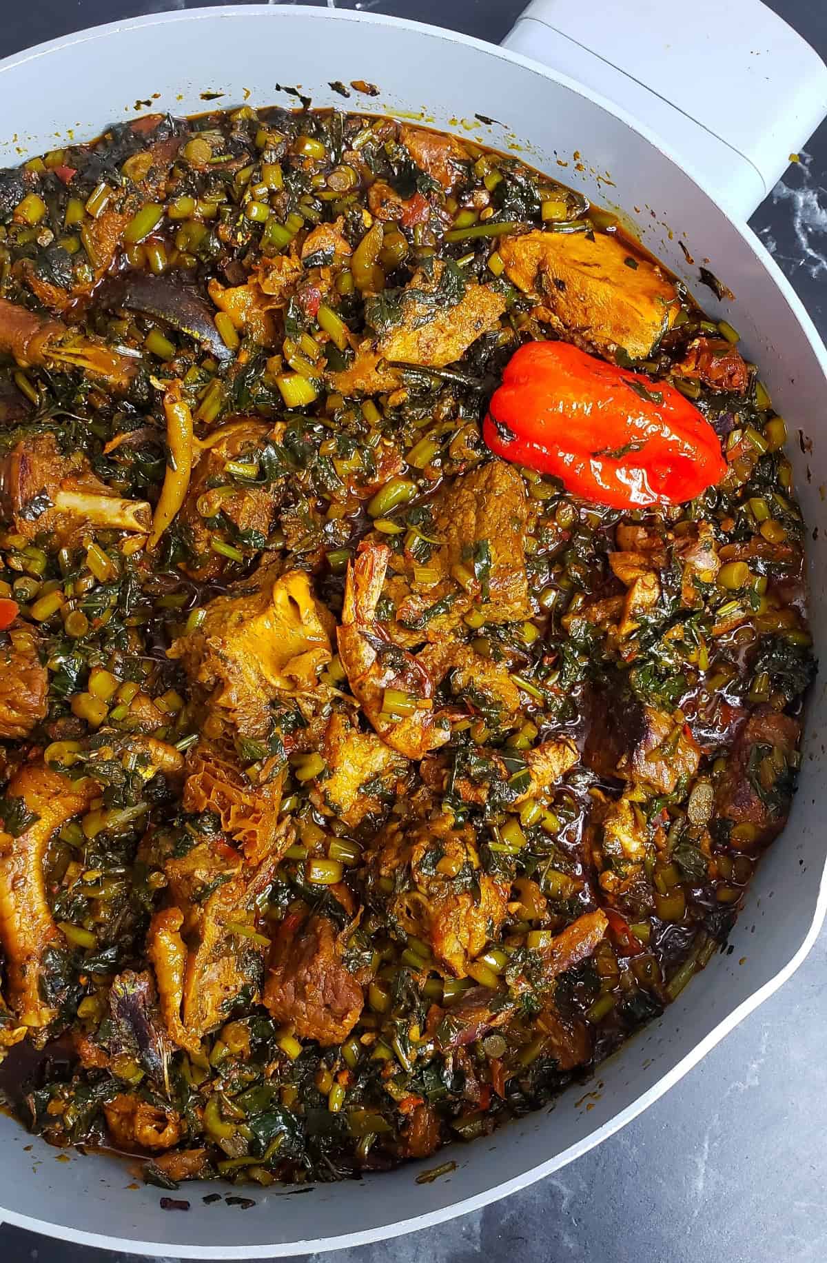 Sweet potato leaves stew in a pot