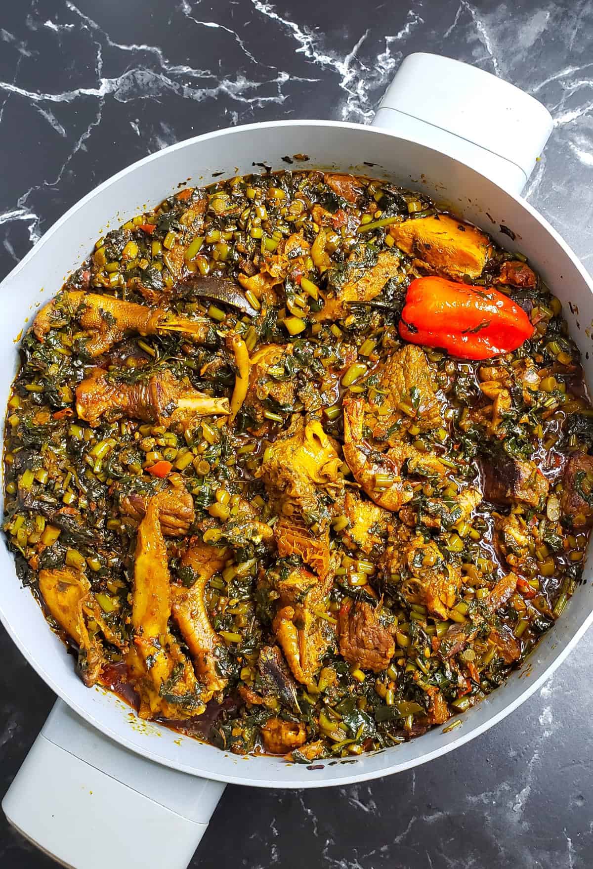 sweet potato leaves stew in a pot