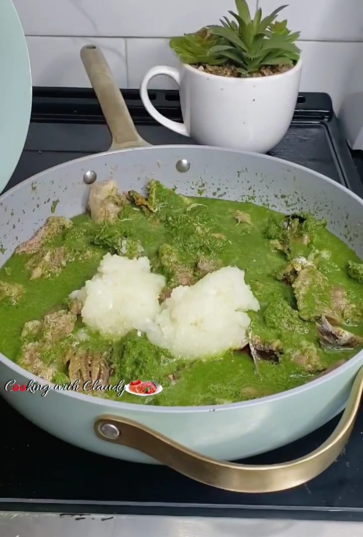 cassava leaf stew in a pot